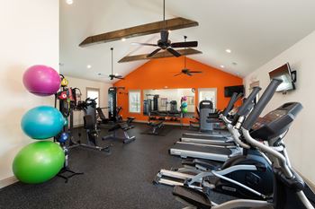 24-Hour club inspired fitness center including cardiovascular and weight equipment